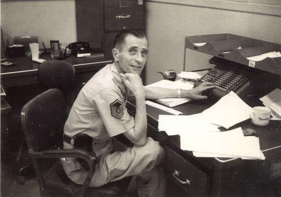 Thaddeus Vincenty at his desk while working for the Air Force, dated approximately 1965.