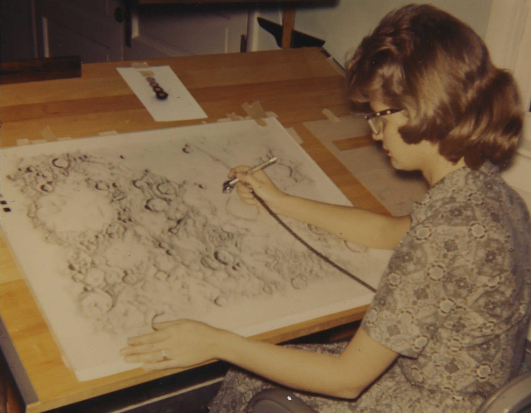 Illustrators like Patricia Bridges were a vital part of ACIC’s moon map-making process, using pens and airbrushes to fill in details of lunar craters, ravines, mountains and plains. Bridges was known to be the best at her craft. Photo courtesy of Patricia Bridges/Lowell Observatory.