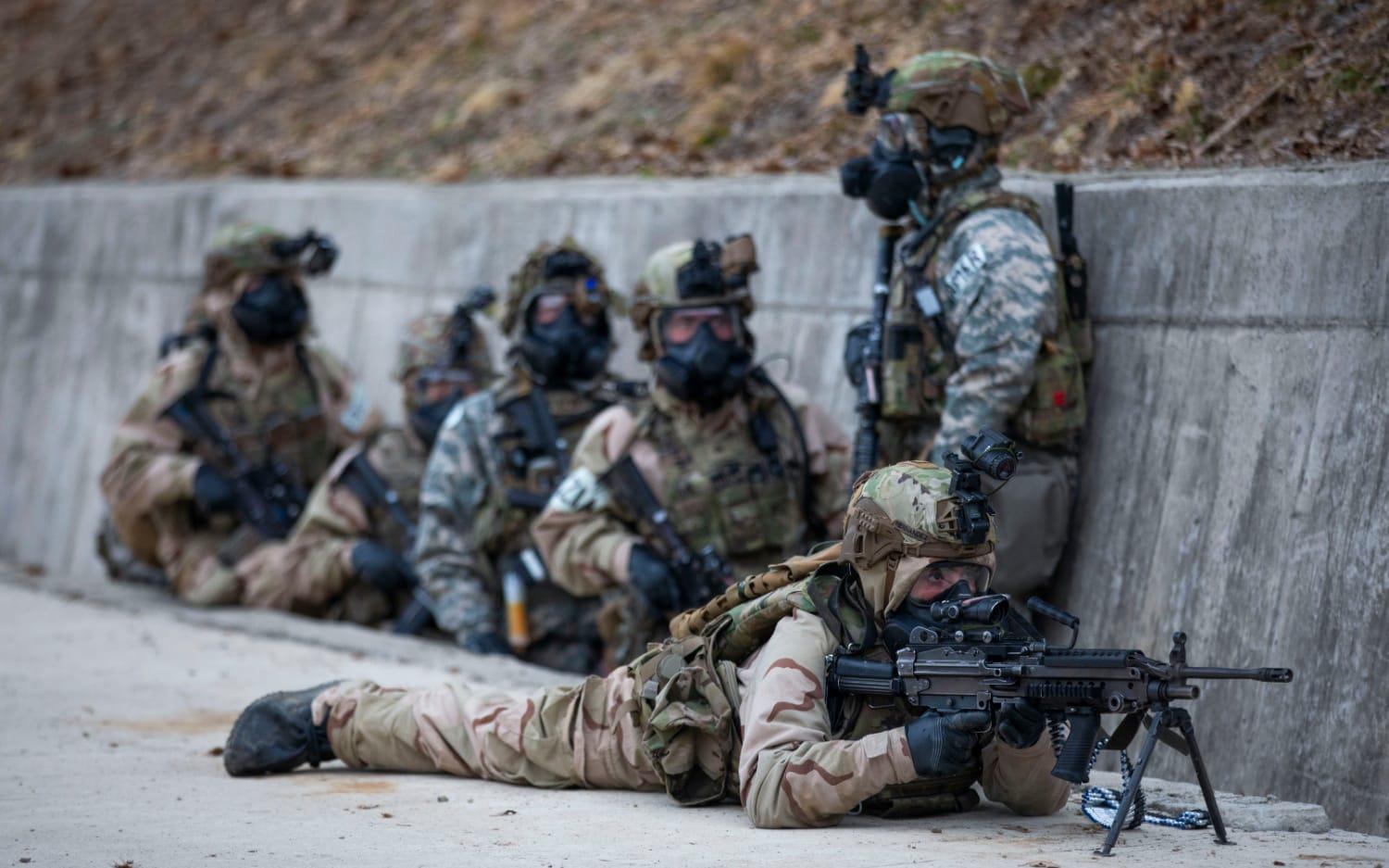 U.S. Army Soldiers hold a breach-line formation during a joint breach operation at Twin Bridges Training Area, Yangju-si, Republic of Korea, during Freedom Shield 25 March 12. (Photo courtesy of U.S. Army)