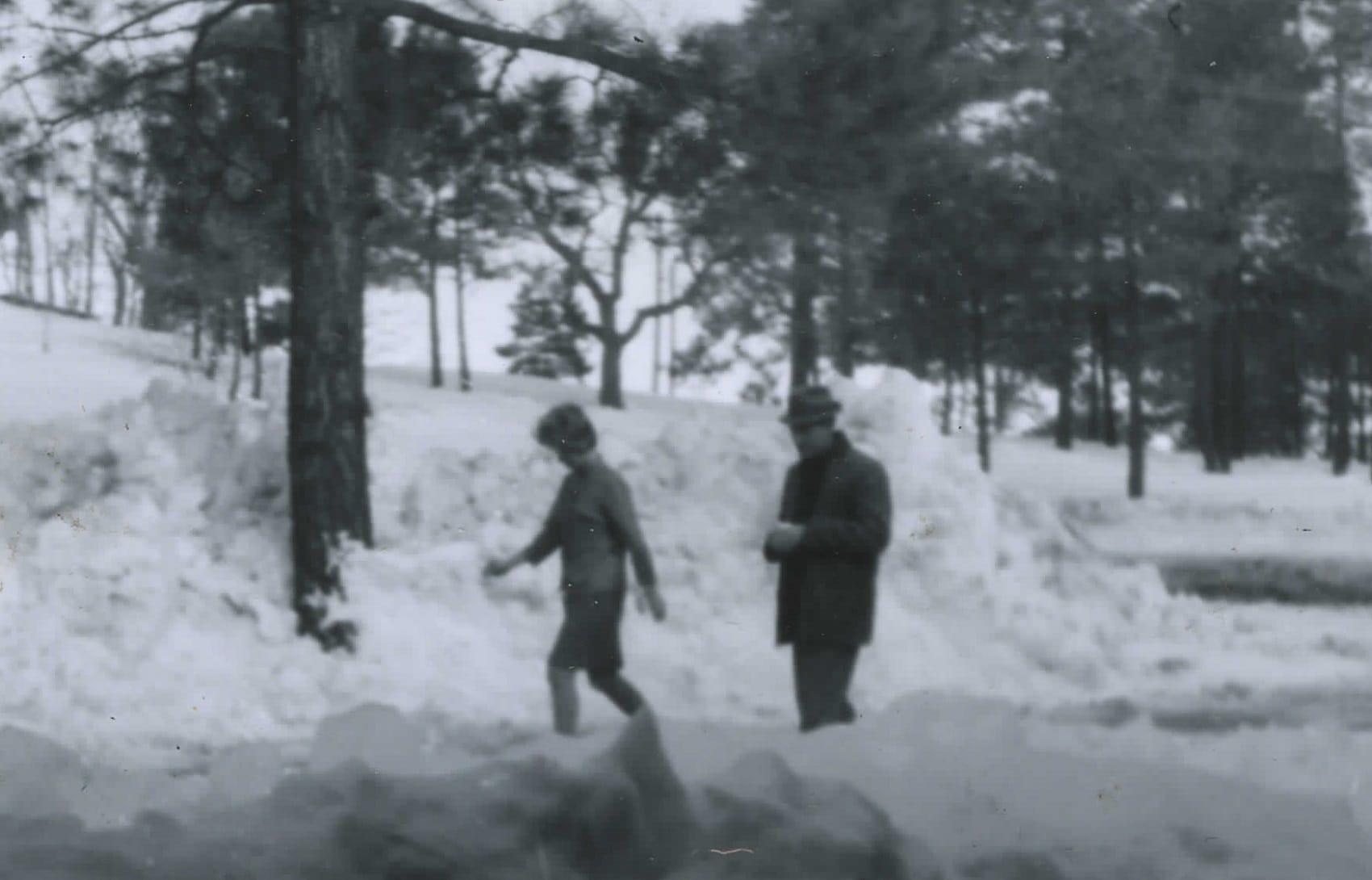 Patricia Bridges (left) hikes in the snow around the grounds of Lowell Observatory. Lowell is located in Arizona, which is typically associated with hot weather. However, in Flagstaff, Ariz., the average low in January is 11 degrees Fahrenheit. Because the telescope dome was unheated, it could be a very cold environment for ACIC’s Lowell team to work. Photo courtesy of Patricia Bridges/Lowell Observatory.